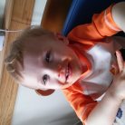 Daycare child loving his spagetti o's