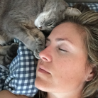 Molly loves to snuggle with Erin's head