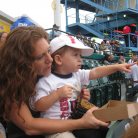 Kelly at a baseball game with her godson